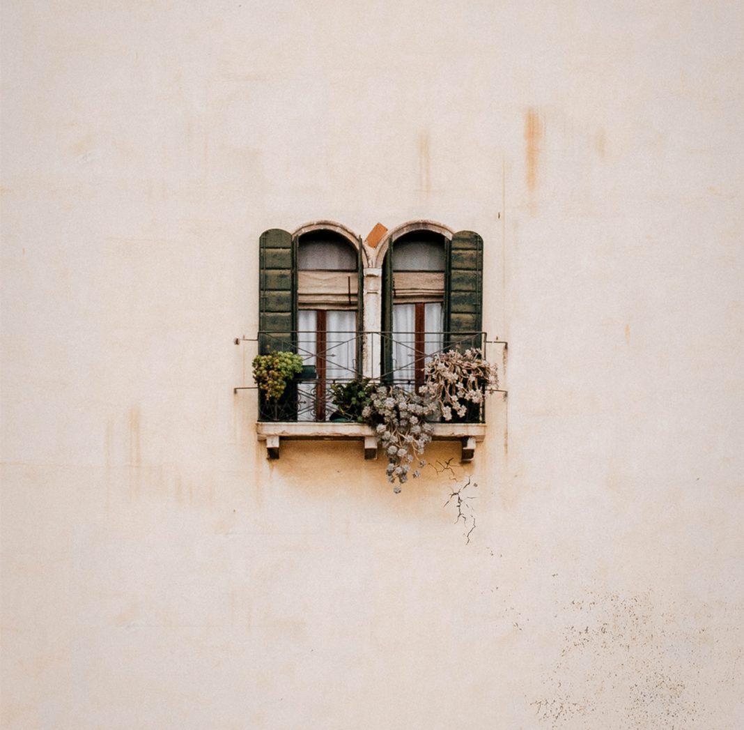 pgreen-wooden-window-on-white-concrete-wall-3750893